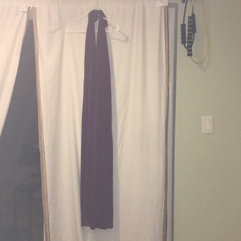 One piece pants and sleeveless top.